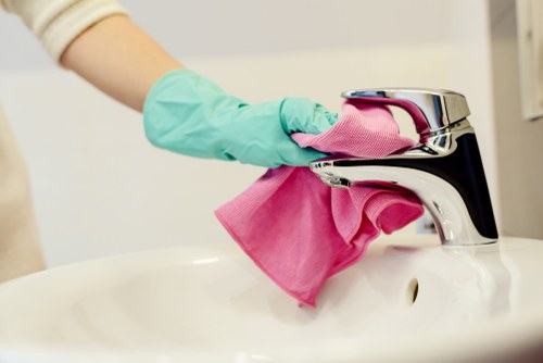 Local cleaners working in a Pimlico apartment after a busy period