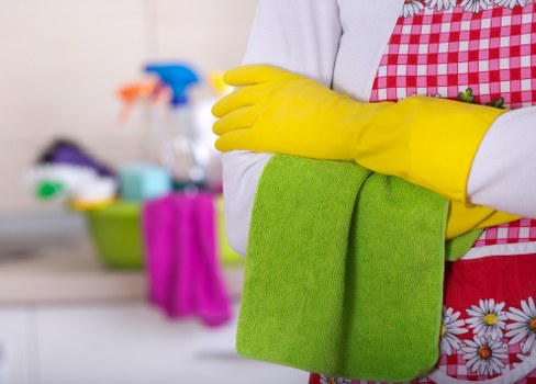 Close-up of a stained mattress being treated during cleaning